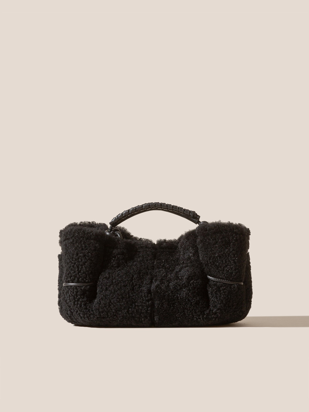 ARTA MINI CURLY SHEARLING - Pleated Crossbody Bag - Black